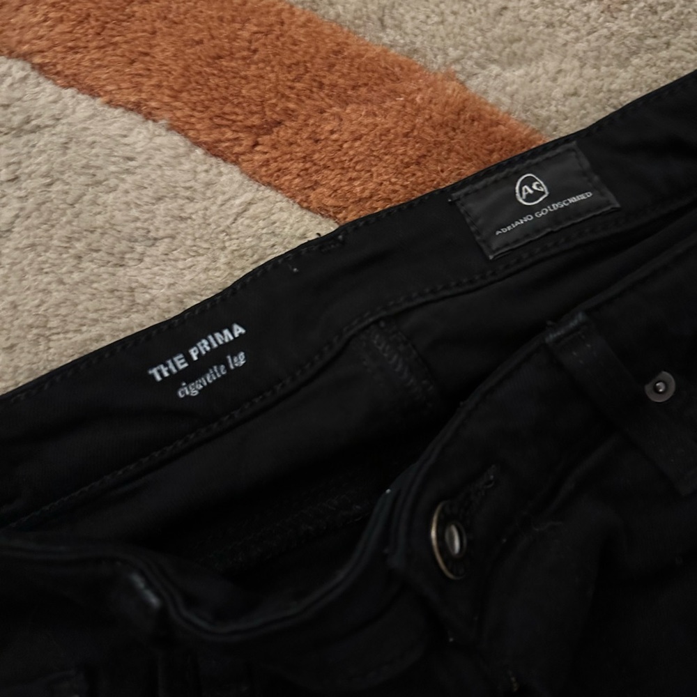 AG the primary cigarette leg in black size 26R